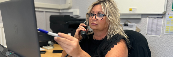 sales executive talking on the phone  to try and attract more customers